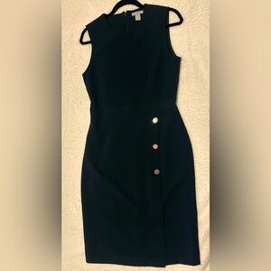 Sleeveless military green dress with button detail